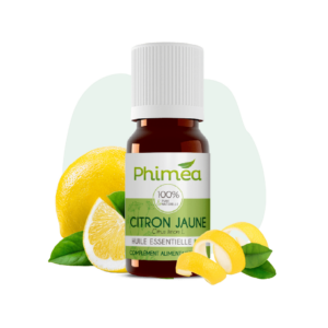 Flacon huile essentielle de citron jaune avec fruit en arrière plan sur fond vert